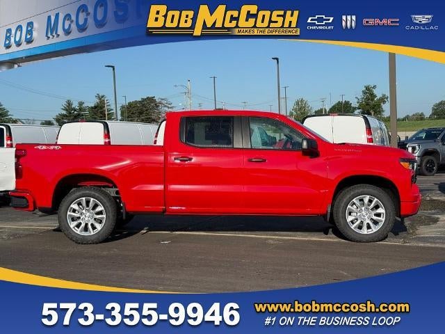 2025 Chevrolet Silverado 1500 Custom in Red Hot — front three-quarter view