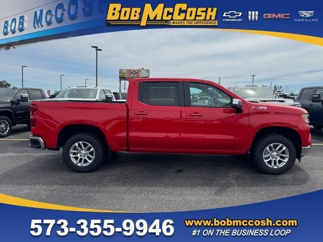 2026 Chevrolet Silverado 1500 LT in Red Hot — front three-quarter view