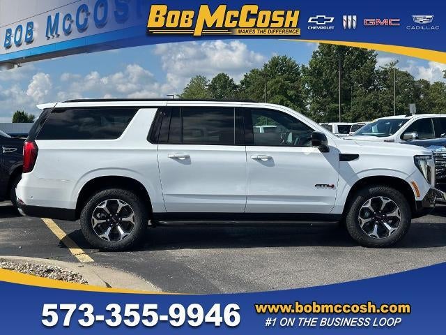 2026 GMC Yukon XL AT4 in Summit White — front three-quarter view