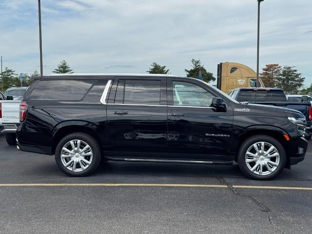 2021 Chevrolet Suburban High Country in Black — front three-quarter view