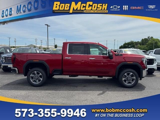 2026 GMC Sierra 2500 HD SLT in Volcanic Red Tintcoat — front three-quarter view