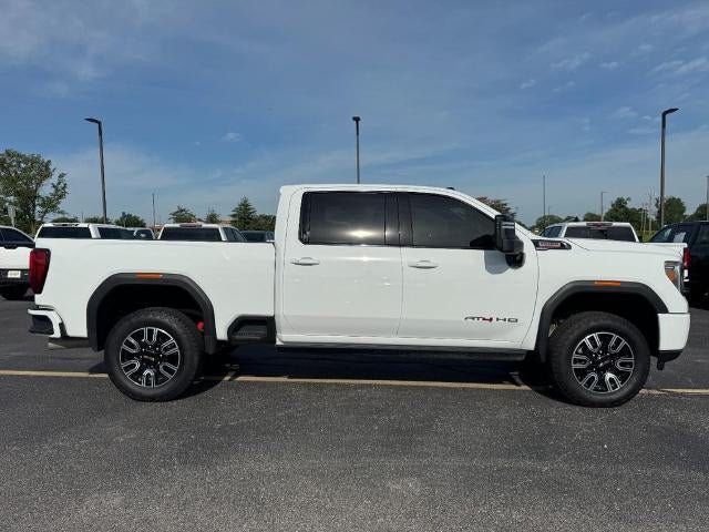 2023 GMC Sierra 3500 HD AT4 in Summit White — front three-quarter view