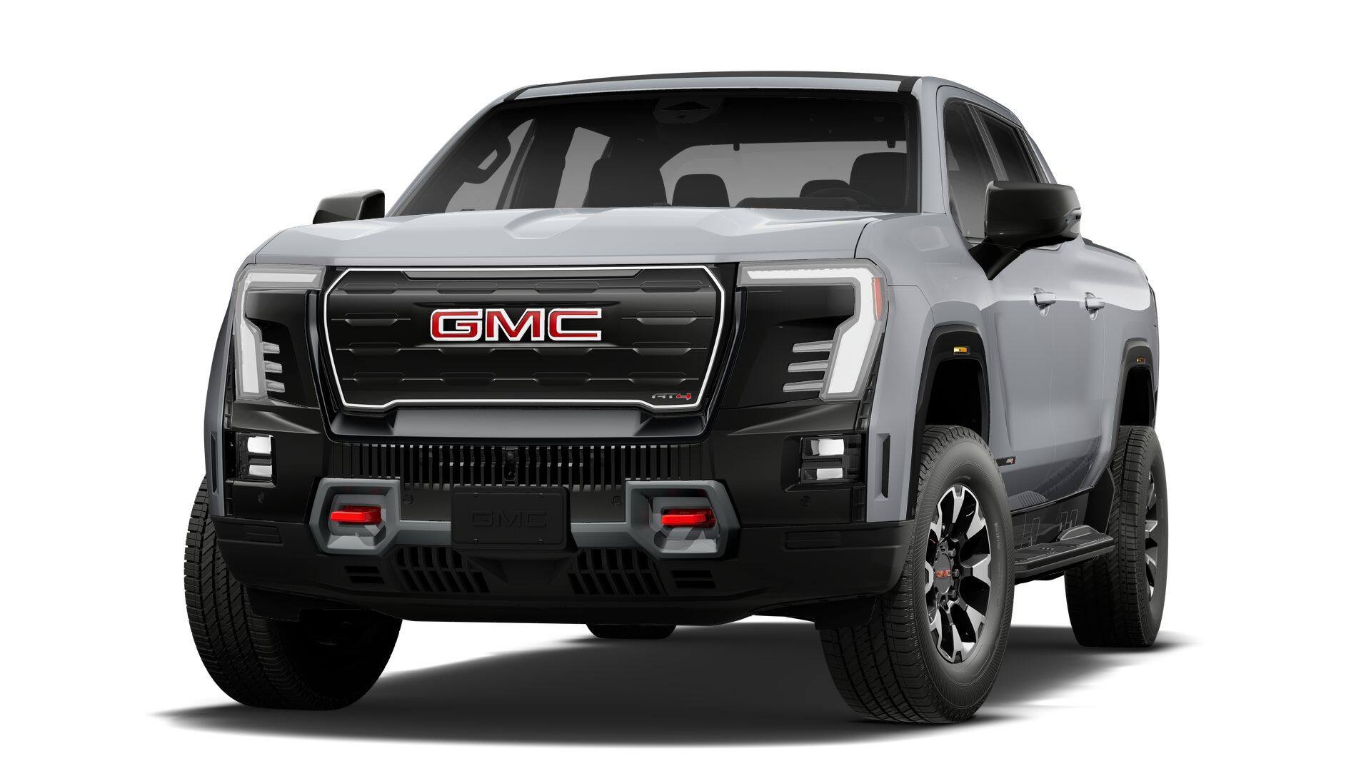 2026 GMC Sierra EV AT4 Max Range in Thunderstorm Gray — front three-quarter view
