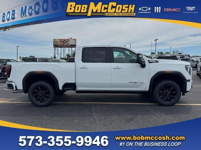 2026 GMC Sierra 2500 HD AT4 in Summit White — front three-quarter view