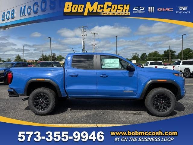 2026 GMC Canyon Elevation in Rapids Metallic — front three-quarter view