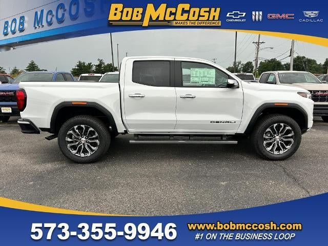 2026 GMC Canyon Denali in Summit White — front three-quarter view