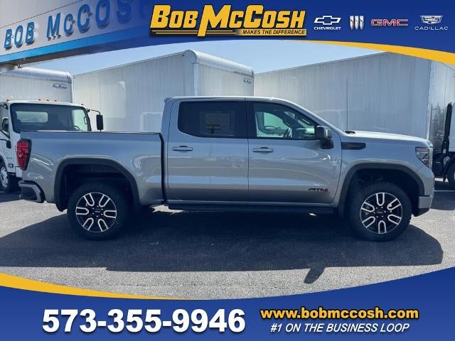 2026 GMC Sierra 1500 AT4 in Sterling Metallic — front three-quarter view