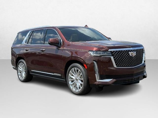 2023 Cadillac Escalade Premium Luxury in Mahogany Metallic — front three-quarter view