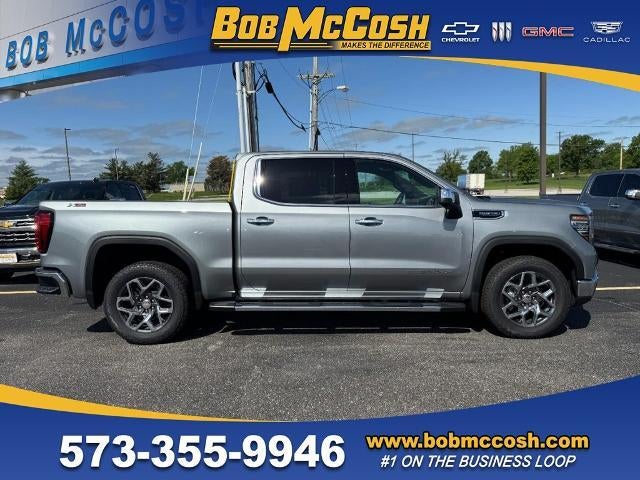 2026 GMC Sierra 1500 SLT in Sterling Metallic — front three-quarter view