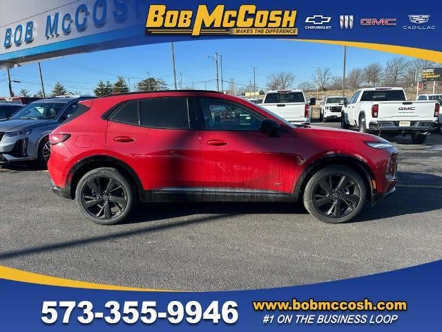 2025 Buick Envision Sport Touring in Brilliant Red — front three-quarter view